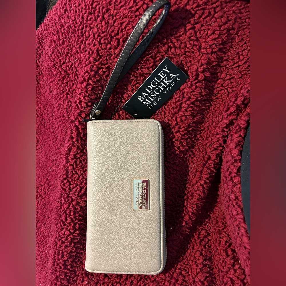 Badgley Mischka Cream Pebbled Wristlet Clutch with Gold Logo